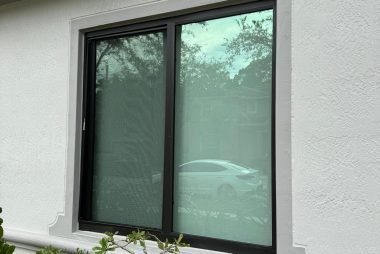 Impact Horizontal Roller Window. Bronze Frame. Low-E, Laminated Glass. HVHZ Proof.